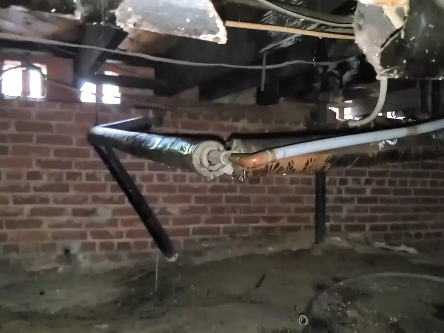 Crawlspace drain piping and cleanout work below a home related to Buying a 1920s Altadena Home? A Plumbing Inspection Checklist on the blog13-side section