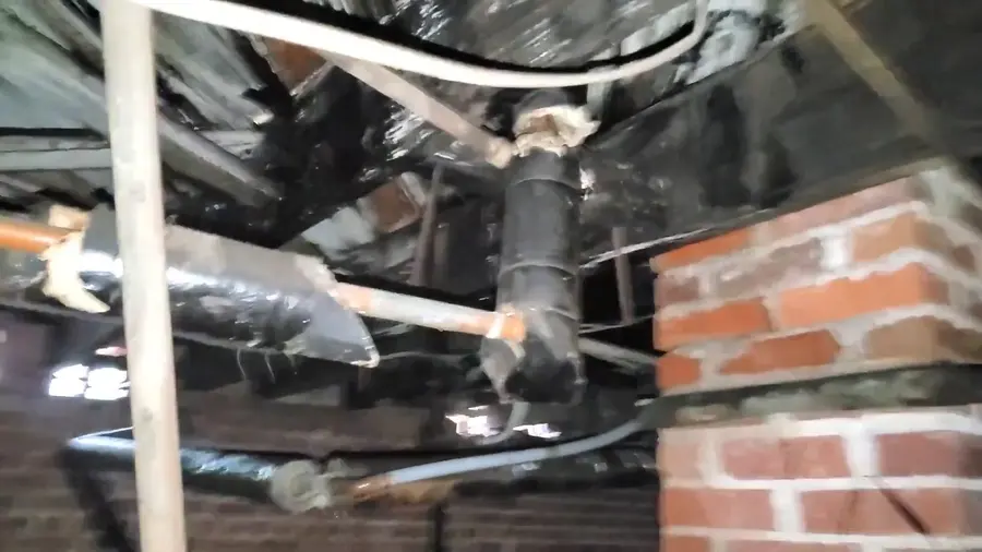 Crawlspace drain piping and cleanout work below a home related to Buying a 1920s Altadena Home? A Plumbing Inspection Checklist