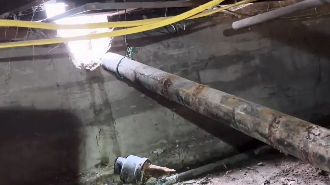 Crawlspace drain piping and cleanout work below a home for Trenchless Sewer Replacement Explained: How It Works in Altadena's Older Neighborhood