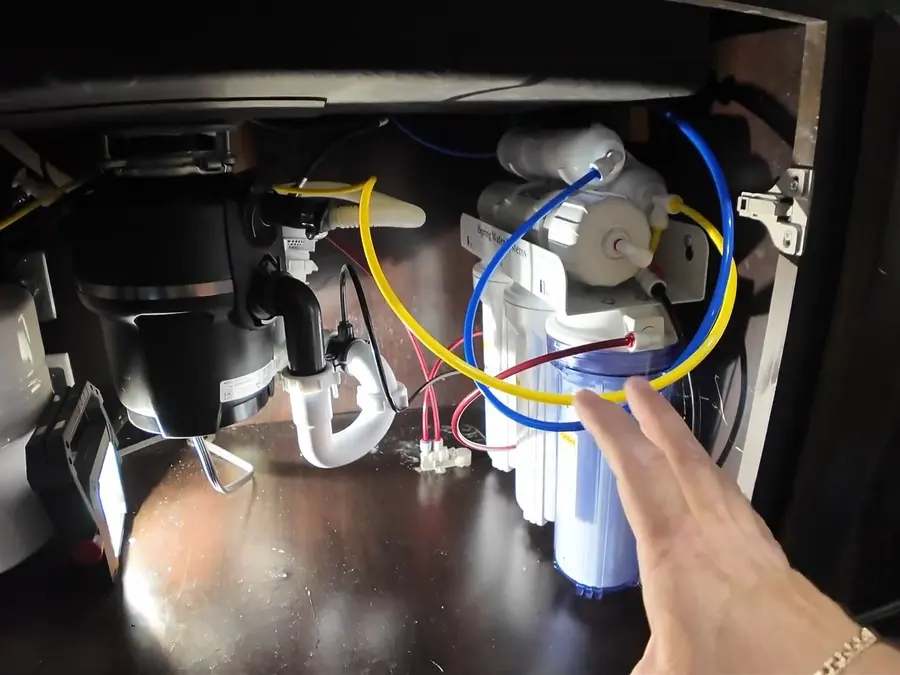 Garbage disposal unit and wiring under a kitchen sink related to Garbage Disposal Services in Altadena, CA on the gd-side-01 section