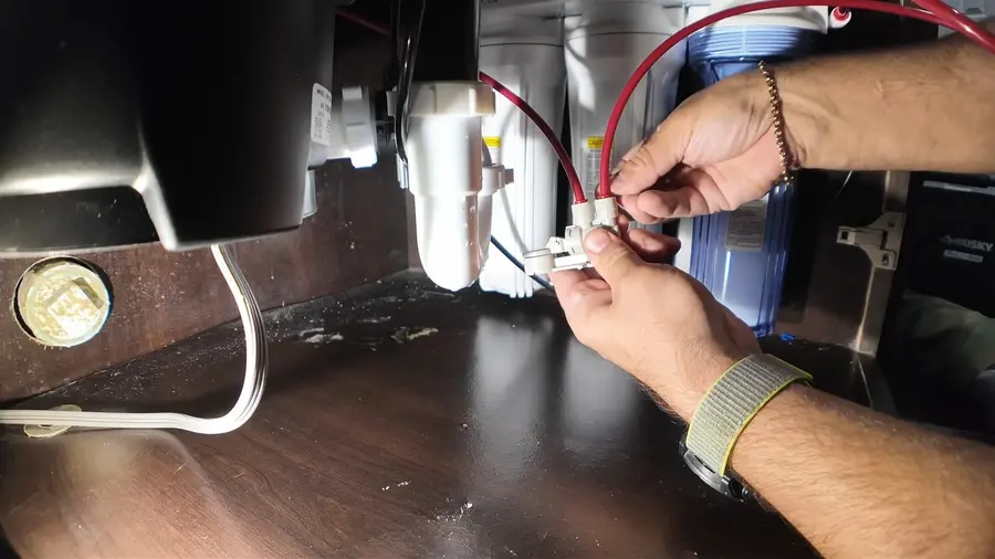 Garbage disposal unit and wiring under a kitchen sink related to Garbage Disposal Services in Altadena, CA