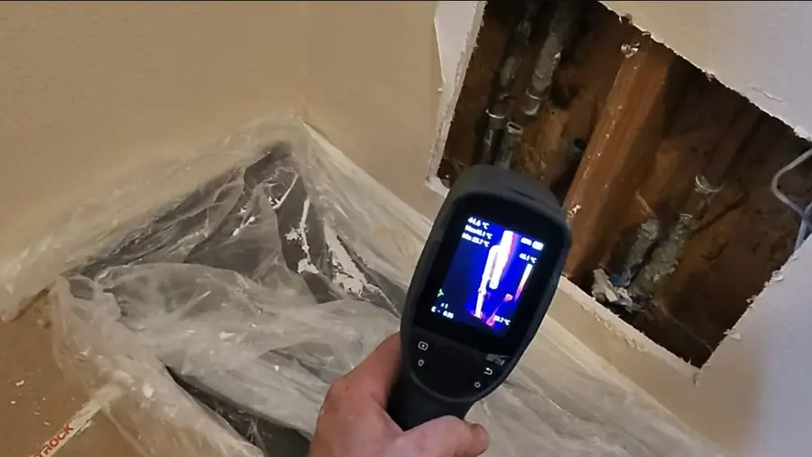 Leak detection equipment pointed at hidden plumbing related to Burst Pipe Repair in Altadena, CA