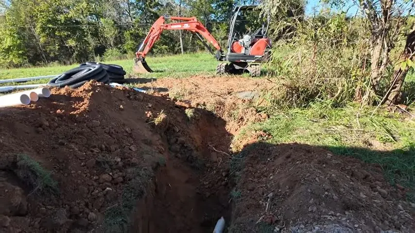 Open sewer trench with new pipe being laid related to Sewer Line Replacement in Altadena, CA