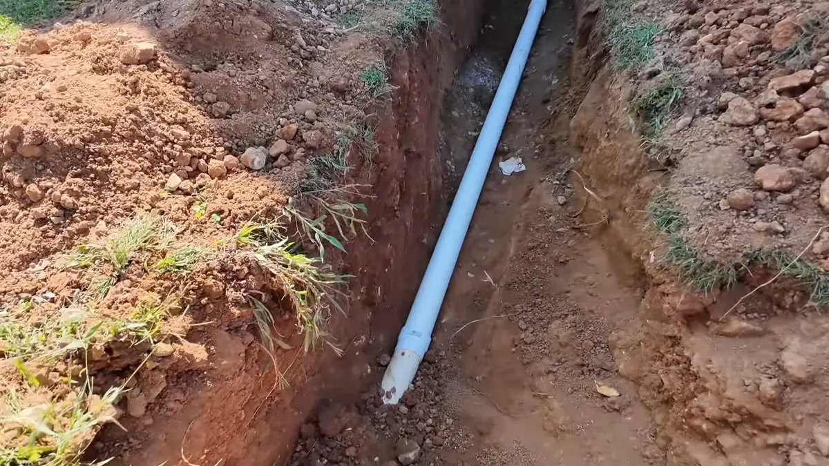 Open sewer trench with new pipe being laid for Sewer Line Replacement in Altadena, CA