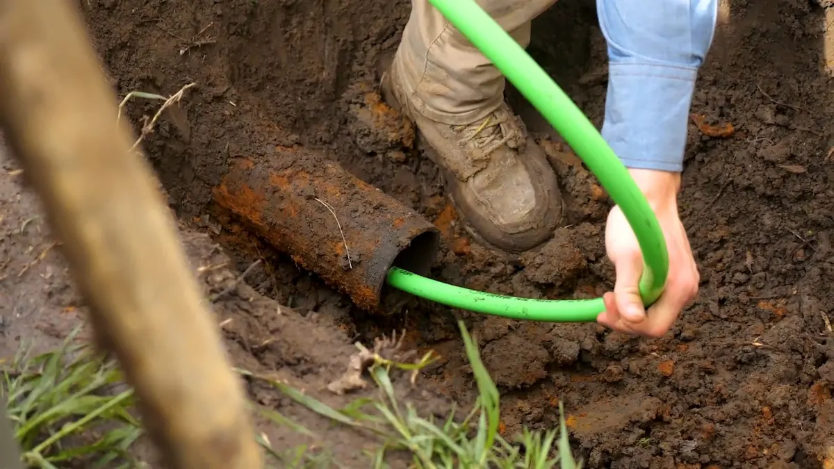 Trenchless sewer repair equipment and pipe liner work during a plumbing service visit in Christmas Tree Lane