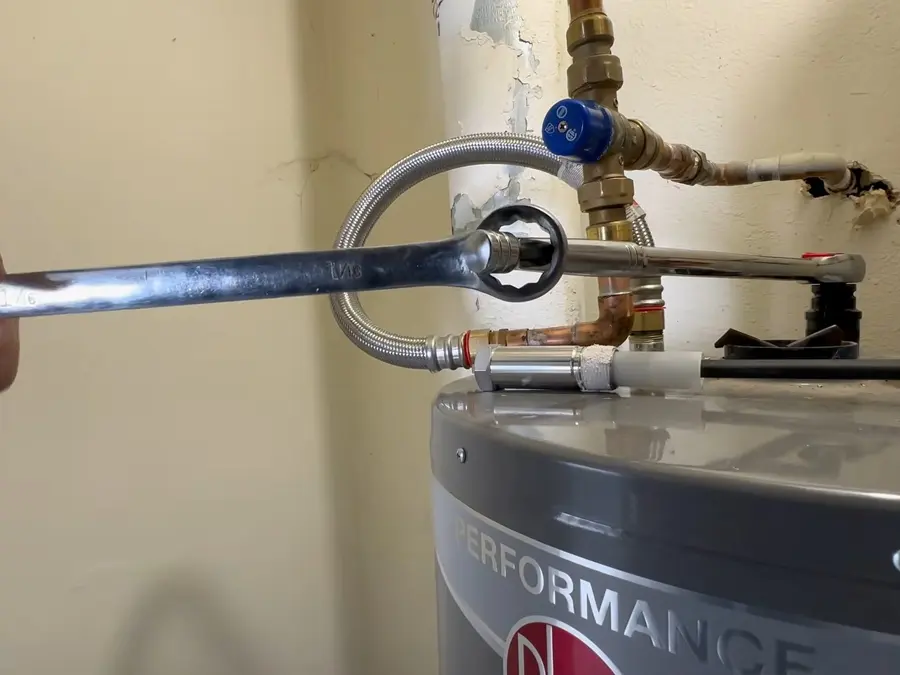 Water heater anode rod and top tank fittings during a plumbing service visit in Arcadia on the arc-side-01 section