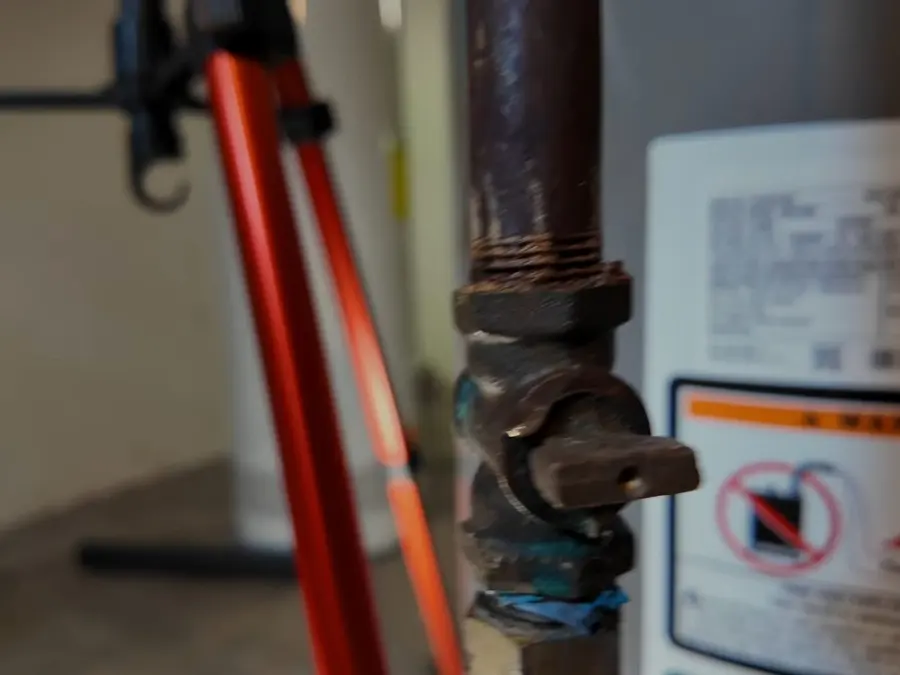 Residential water heater tank, supply lines, and service fittings related to Tankless Water Heater Services in Altadena, CA on the tankless-side-01 section